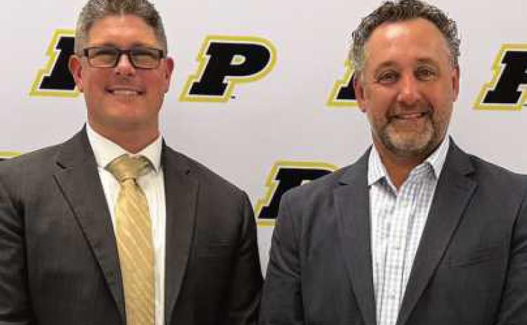 Pictured from left: Dr. Brad Contat and Mike Acomb.