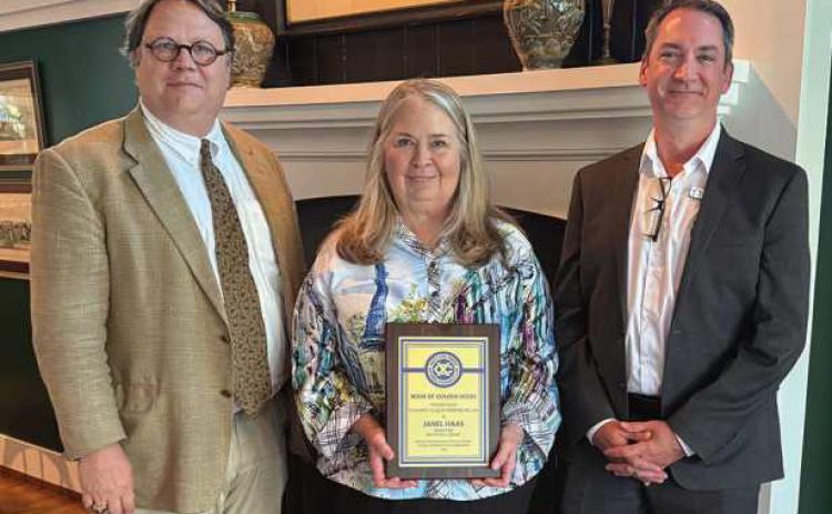 Pictured from left: David Munger, Way Library Board of Trustees; Way Library Director Janel Haas, and Way Library Assistant Director Travis McAfee.