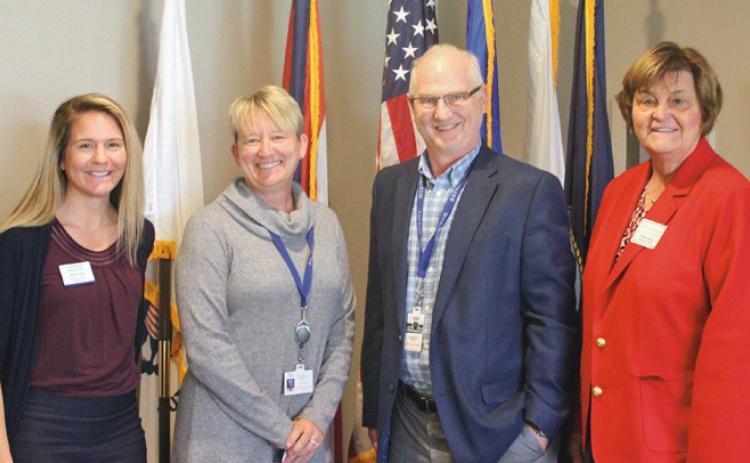 From left are chamber board member Lindsay Buker of Skotynsky Financial Group, workforce administrator Mary DeWitt of OhioMeansJobs Wood County, senior workforce consultant Pete Prichard of Wood County Educational Services Center and Wood County Commissioner Doris Herringshaw.