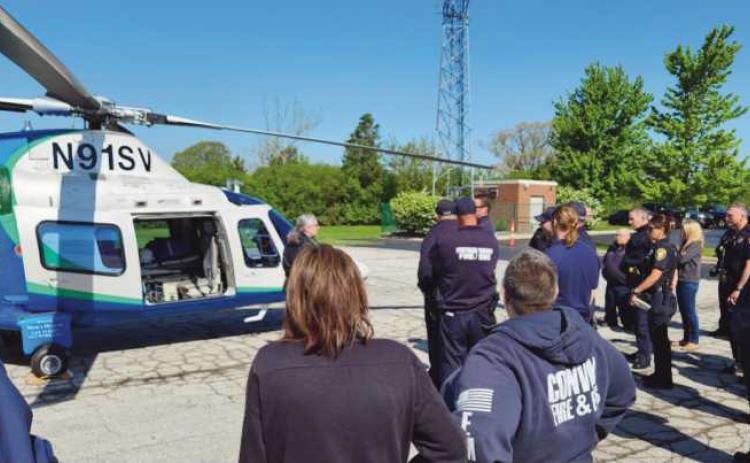 Pilot Meghan Newyear instructs first responders on helicopter landing zone safety.