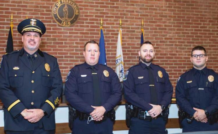 Chief Pat Jones, left, with officers John Growden, Devin Longeway and Konnor Owens.