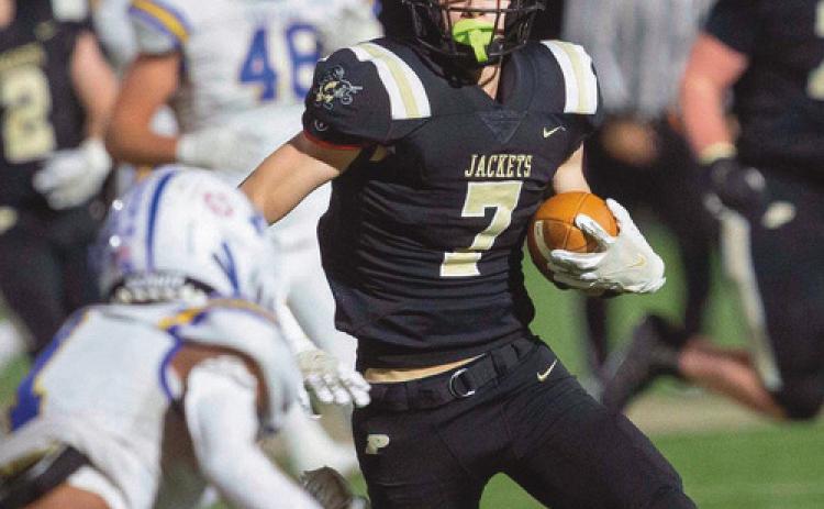 Wide receiver Andrew Hunt attempts to thwart a Findlay defensive back.