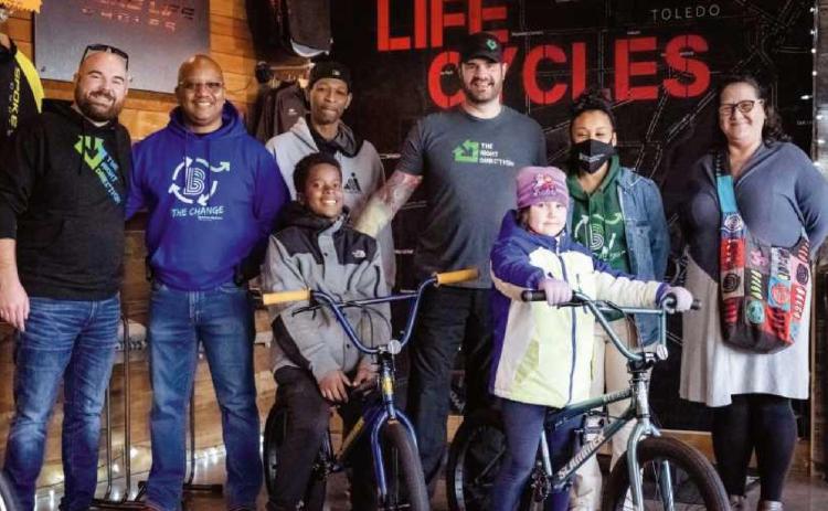 Two youths win BMX bike in guessing contest