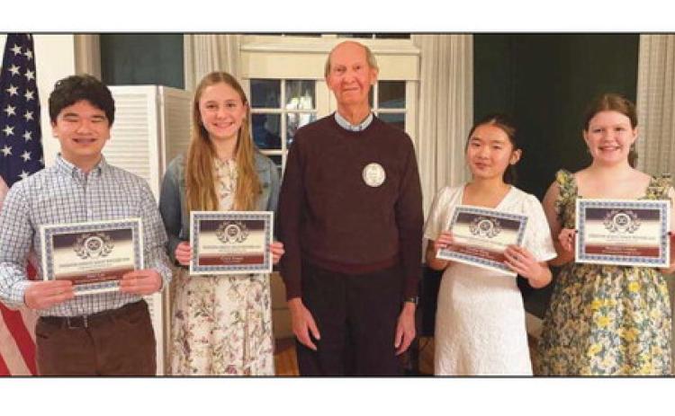 From left: Peter Lee, Perrysburg Junior High School; Gracie Borgelt, St. Rose; Bob Obrock, Perrysburg Exchange Club president; Cynthia Wang, PJHS, and Brooklyn Lindow, PJHS.