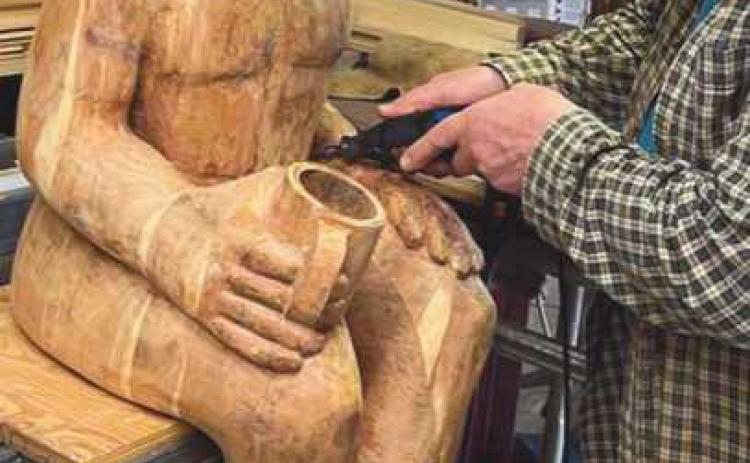 Artist George Farbotko working on Abiding Observer.