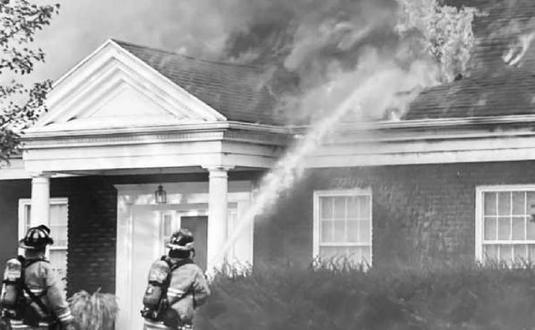 Secor Woods house fire starts in garage