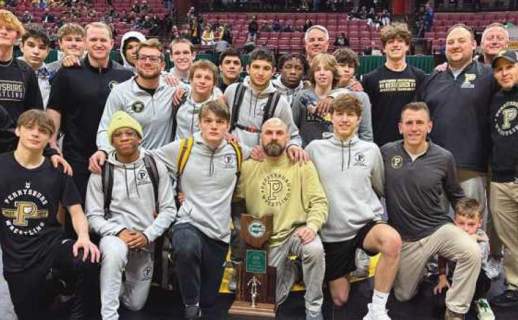 Wrestling team with coach and staff