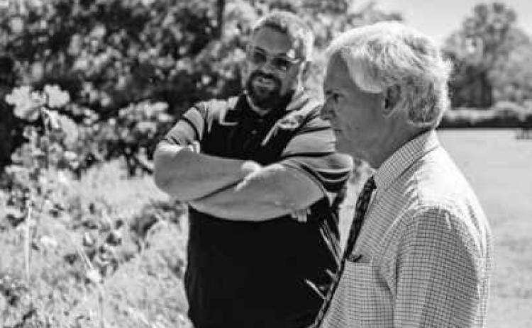 U.S. Congressman Bob Latta discusses water quality improvements with Lucas County Engineer Mike Pniewski.