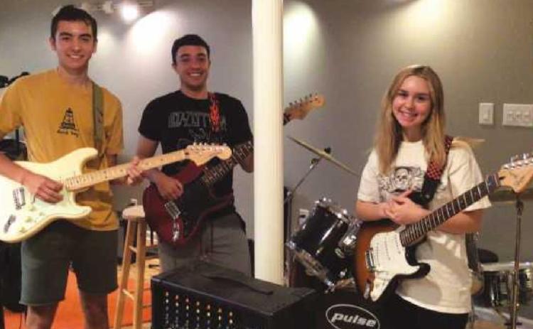 Ricardo Amezquita-Cadavid on guitar, Jack Terry on guitar, Merritt Backus on guitar and keyboard and Autumn Edwards, on drums (not pictured).