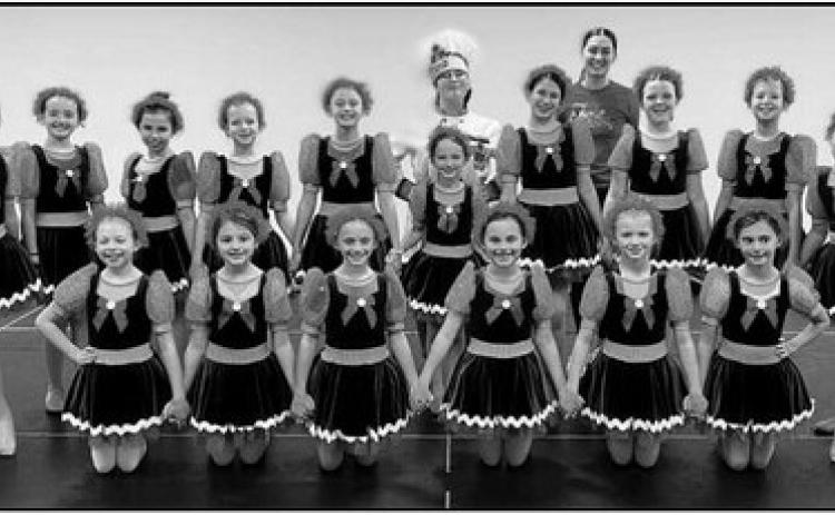 The gingersnap dancers with lead baker Ginger, Olivia Kesling, and choreographer, Megan Burnham, from Perrysburg Dance Academy.