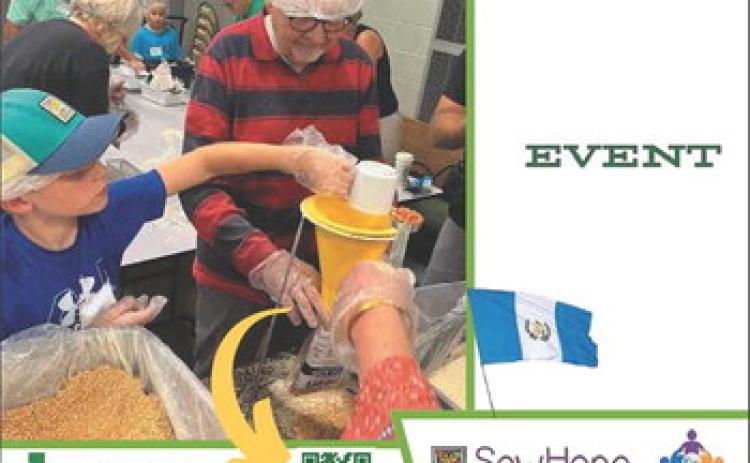 Zoar food packing event with Sew Hope