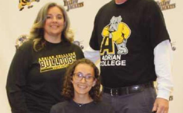 Ciara Heslet will run track for Adrian College where she plans to study interior design. Pictured with her are her parents Todd and Brenda.