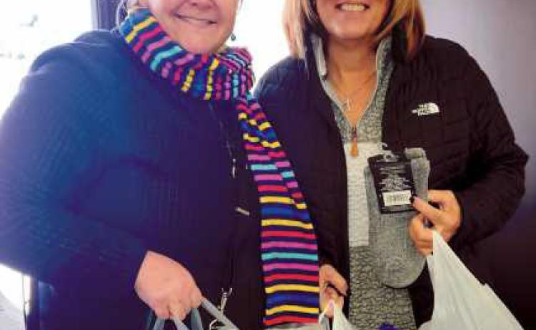 Monclova neighborhood hosts annual Christmas tree lighting, collects donations for Hannah’s Socks