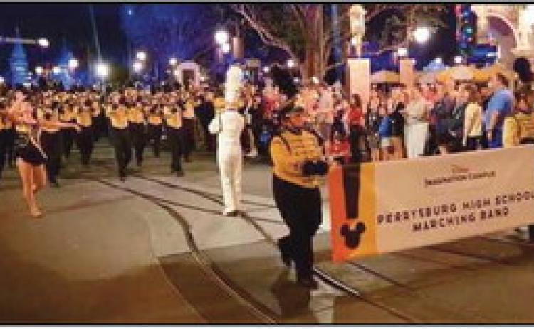 The Perrysburg High School Marching Band performed in a Walt Disney World night parade through the Magic Kingdom in November.