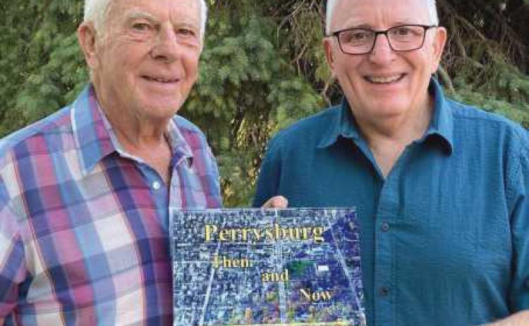 Local historians Gary Franks, left, and Mark Weber, have written “Perrysburg Then and Now.” It features photos of many notable locations around town from years ago in comparison to today, as shown on the page below.