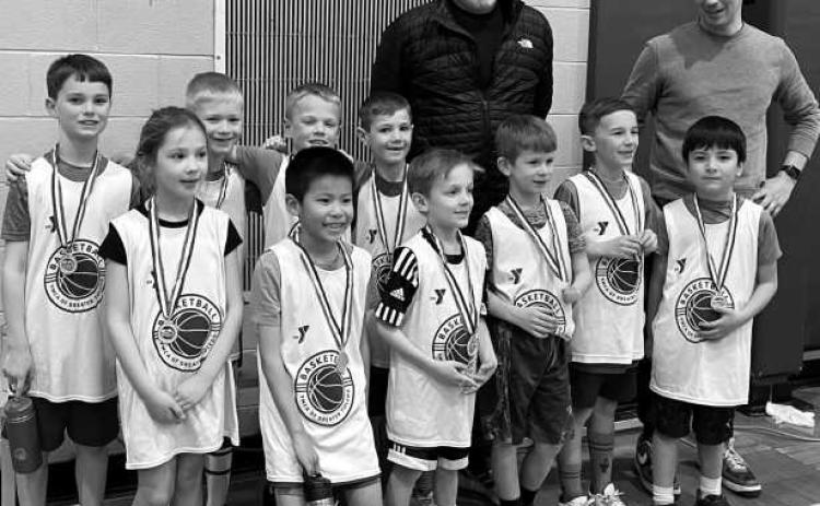 The Pacers basketball team at Fort Meigs YMCA recently went undefeated as they wrapped up their winter season. The team, compromised of 7-and-8-year-olds, is led by Coach Eric Haywood and Coach Tim who helped the Pacers learn to work as a team and improve their skills. Pictured above is the team and coaches, front row, from left: Kaylynn Pirolli, Luke Ng, Thatcher Haywood, AJ McNamee, Hudson Haywood and Elliot Snow. Back row: Luke Konz, Owen Fomich, Emmett Halm and Garret Pleitz.