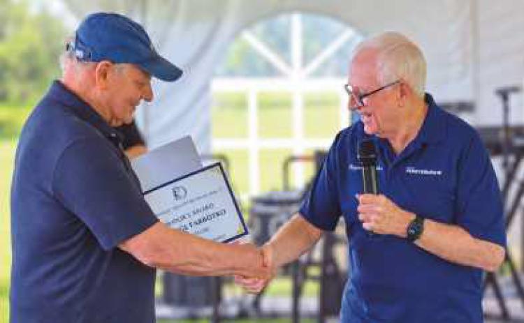 Mayor Weber presented the Mayor’s Award to George Farbotko, creator of “Observer.”