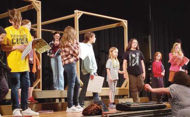 Local children practice for their upcoming performance.