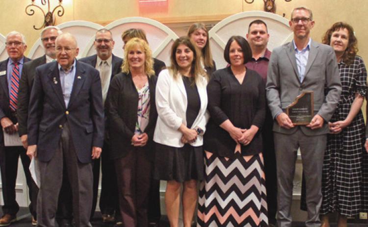Above is Jerry Greiner, NWSD president, far right, with his staff and board members.