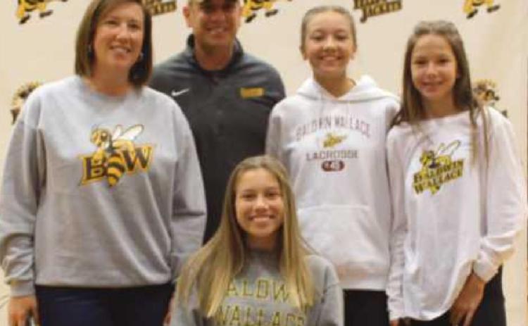 Lauren Getchey will play lacrosse for Baldwin Wallace University, where she plans to major in psychology. With her are her parents Kristin and John and her sisters Natalie and Leah.