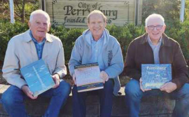 The annual Perrysburg Home for the Holidays parade grand marshal duties will be shared by left, Gary Franks, Richard Baranowski and Mark Weber.