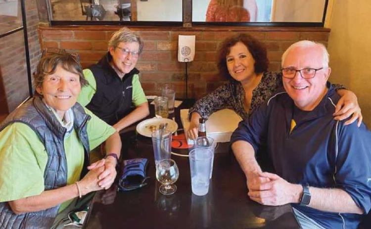 Clockwise, from left, Kathi Weiss and Cathie Rowand with Ms. Rowand’s PHS classmates Rachel and Mark Weber.