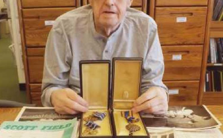 Jack McPherson with Dale Thompson’s Air Medal and Distinguished Flying Cross.