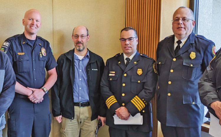 Local first responders joined their counterparts across Wood County to ask the commissioners to fund a $3.4 million countywide computer aided dispatch system. From left are Rossford Police Chief Todd Kitzler, Perrysburg Police Chief Patrick Jones, Perrysburg Township Sergeant Scott Moskowitz, Perrysburg Township Deputy Fire Chief Jim Rodriguez, Fire Chief Tom Brice and township police Lieutenant David Nixon.