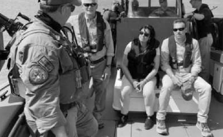 Above, Congressman Latta, standing at left, participated in a river ride-along with the Texas Department of Public Safety. Below, he visited the Donna, Texas migrant processing facility and met with Border Patrol agents.