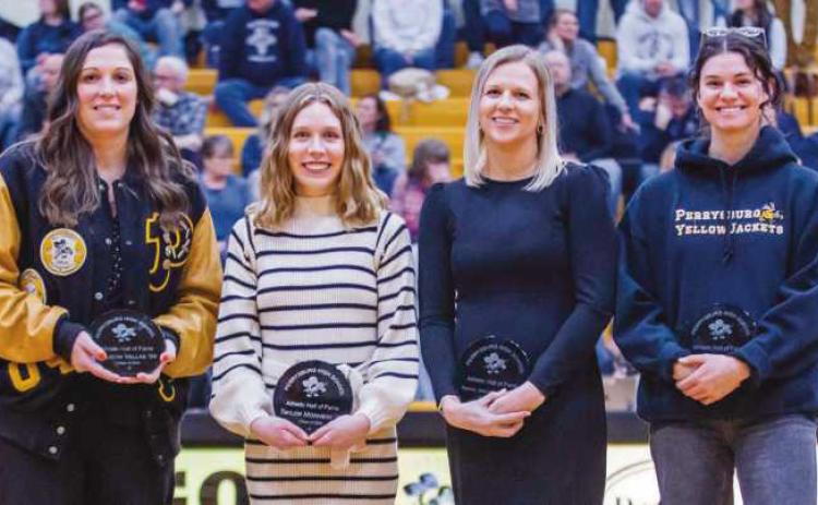 Above, former PHS athletes with plaques at Hall of Fame induction ceremony, from left, are Allison Vallas, Taylor Monheim, Rachel Mathews Heath and Courtney Clody.
