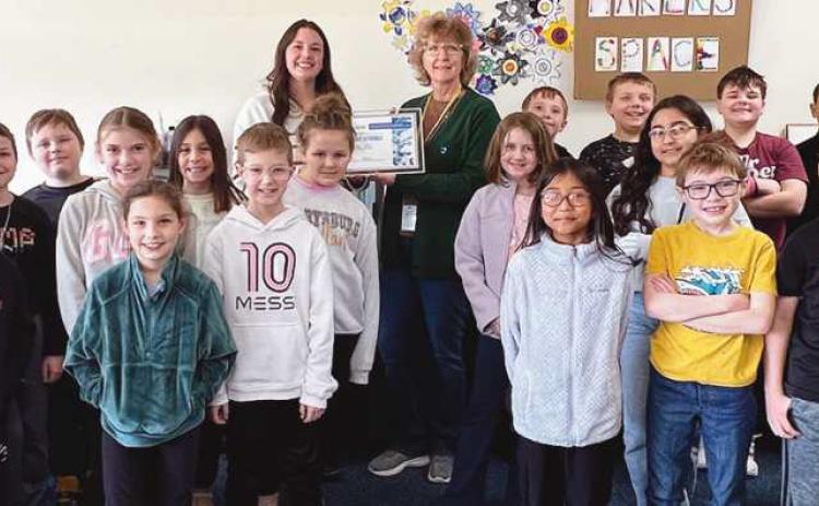 Brooke Stroble, Woodland Elementary STEM teacher, was presented with a $500 WATER grant.
