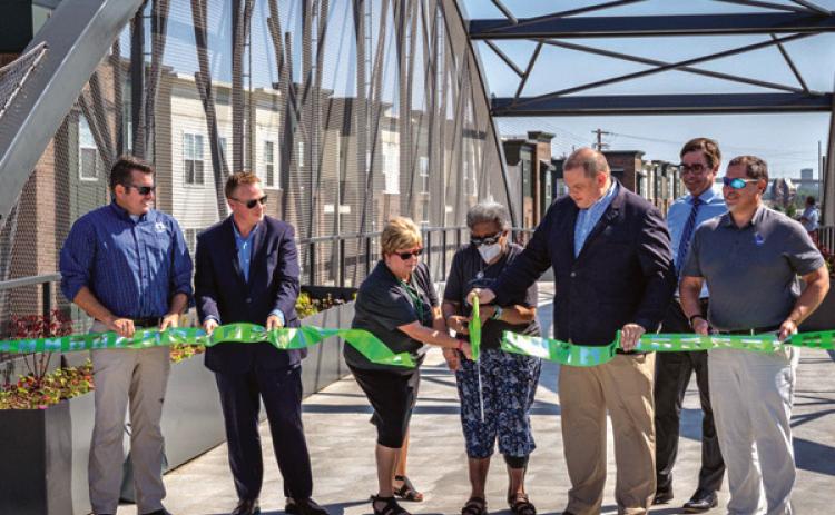 New pedestrian bridge connecting  Glass City, International parks dedicated