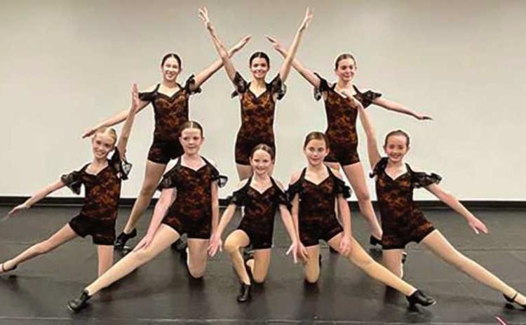 Perrysburg Dance Academy dancers preparing for their tap roles as Hot Chocolate dancers. Pictured top row, Makenzie Burnham, Adrianna Garcia (graduating senior), Genevieve Stierman; bottom row, Jaclyn Kantner, Molly Hayes, Johanna Czech, Stella Rygalski and Madilyn Maher.
