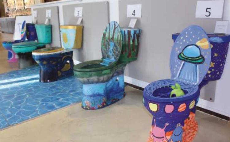 The five decorated toilets are showcased at Waterhouse bath &amp; kitchen studio on East Indiana Avenue.