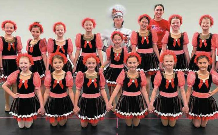 The gingersnap dancers with lead baker Ginger, Olivia Kesling, and choreographer, Megan Burnham, from Perrysburg Dance Academy.