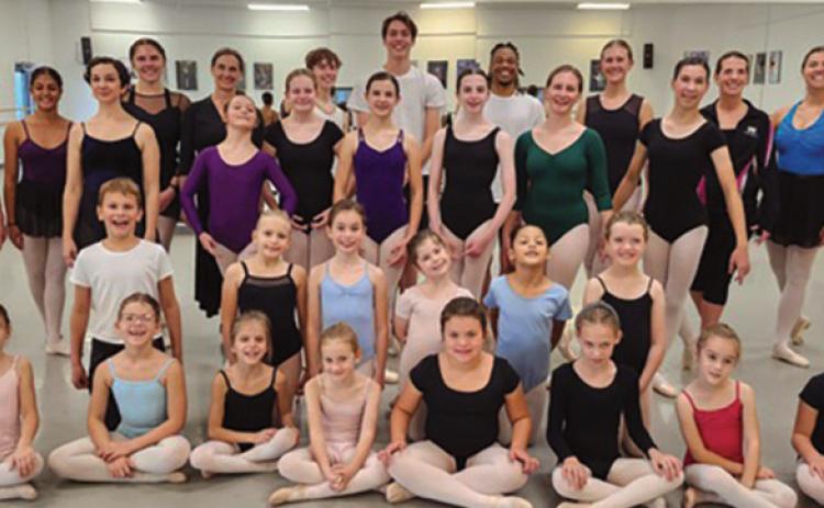 Perrysburg area residents pictured are dancers in BTT’s “A Night Before Christmas At the Museum.” The performers include Perrysburg area residents Jack Cygnor, back row, fifth in from left, and Gwendlyn Bechtol, front row, fifth in from the left.