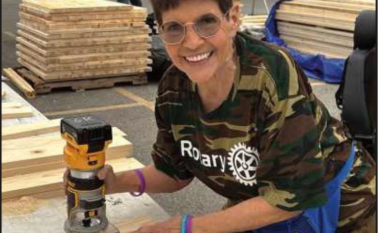Rotarian Maris Brenner at a Sandusky. recent build beds event in