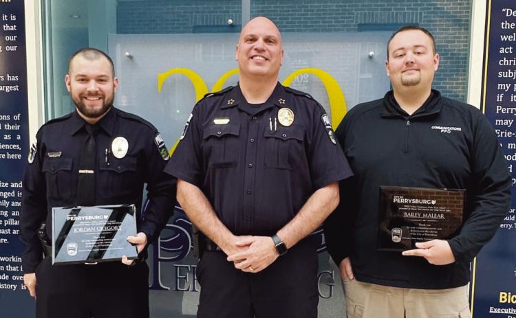 Pictured from left, Officer Jordan Gregory, Police Chief Patrick Jones and Bailey Malear