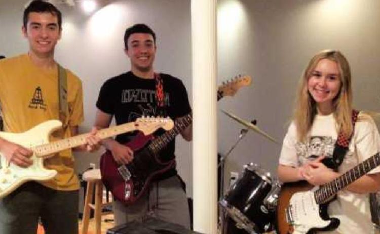 Ricardo Amezquita-Cadavid on guitar, Jack Terry on guitar, Merritt Backus on guitar and keyboard and Autumn Edwards, on drums (not pictured).