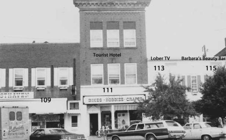 By 1974, businesses had changed in addresses 109 through 115 Louisiana Avenue.