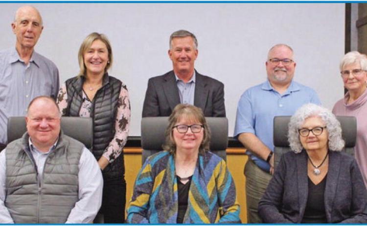 Above, from left, are board vice president Eric Benington, president Judith Sander and board member Judith Paredes; back row, from left, are board members Bill Green, Diane Balczerak, Paul Welker, Ken Sutter and new member Joan Kuchcinski of Educational Service Center of Lake Erie West. She took the oath of office along with returning board members Ms. Balczerak, Ms. Sander, Ms. Paredes and Mr. Sutter. Not shown is board member Kathy Limes.