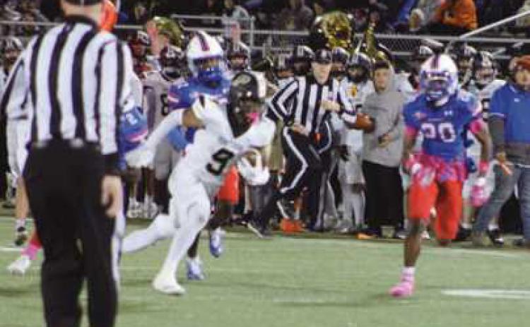 Wide receiver Sam Lawanson eludes the last of the Blue Devil defenders enroute to a touchdown.
