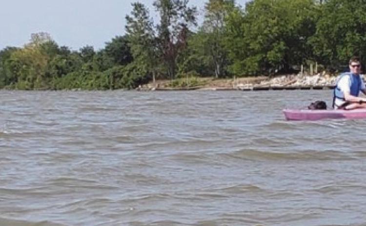 Joe Sparks swam from the Maple Street boat launch in Perrysburg to Veterans Memorial Park in Rossford September 12 to raise money for women’s programs.