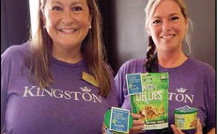 Kingston Residence of Perrysburg Executive Director Karen Burnard, left, and Mandie Mathews, RN and director of nursing, delivered dill pickle goodies to local businesses recently in celebration of pickle month. Learn more about senior and/or memory care by calling 419-872-6200 or visiting 333 East South Boundary Street.