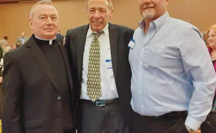 From left, Fr. Neil Kookoothe, Fred Moor and Joe D’Ambrosio.