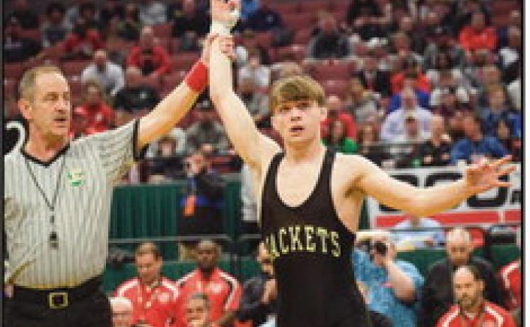 Marcus Blaze as a junior at PHS, capturing his third state title.