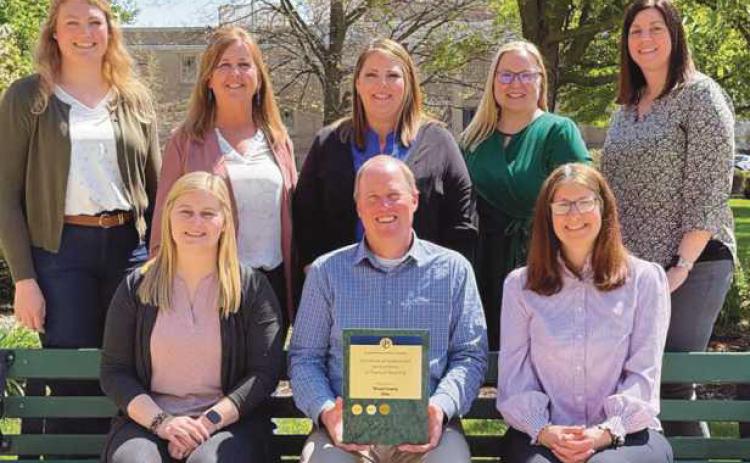 Auditor Oestreich with the fiscal and payroll teams. Back row: Lauren Gentry, Tanya Tolles, Amy Emmerich, Michelle Karns and Amanda Holman. Front row: Stephanie Abke, Auditor Matthew Oestreich and Julie Allison.