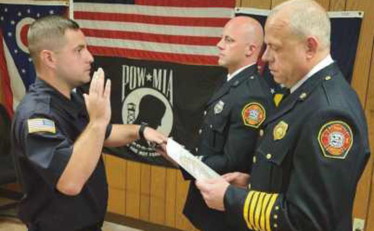 From left: New Firefighter/EMT Drew Lasley, Captain Michael Hampton III and Fire Chief Tom Brice.