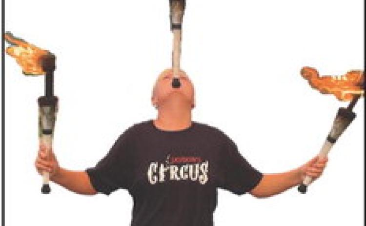 Jaydon Whiting, 12, has set two new kids world records for juggling. Last year he set the record for the longest time juggling three balls. This year he has the record for the longest time juggling five balls and the longest time juggling clubs for males ages 10 to 12. A seventh grade student at Perrysburg Junior High School, Jaydon has been doing circus arts for most of his life. He said juggling is a huge passion.
